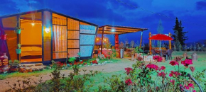 La Tata cabaña y zona de camping
